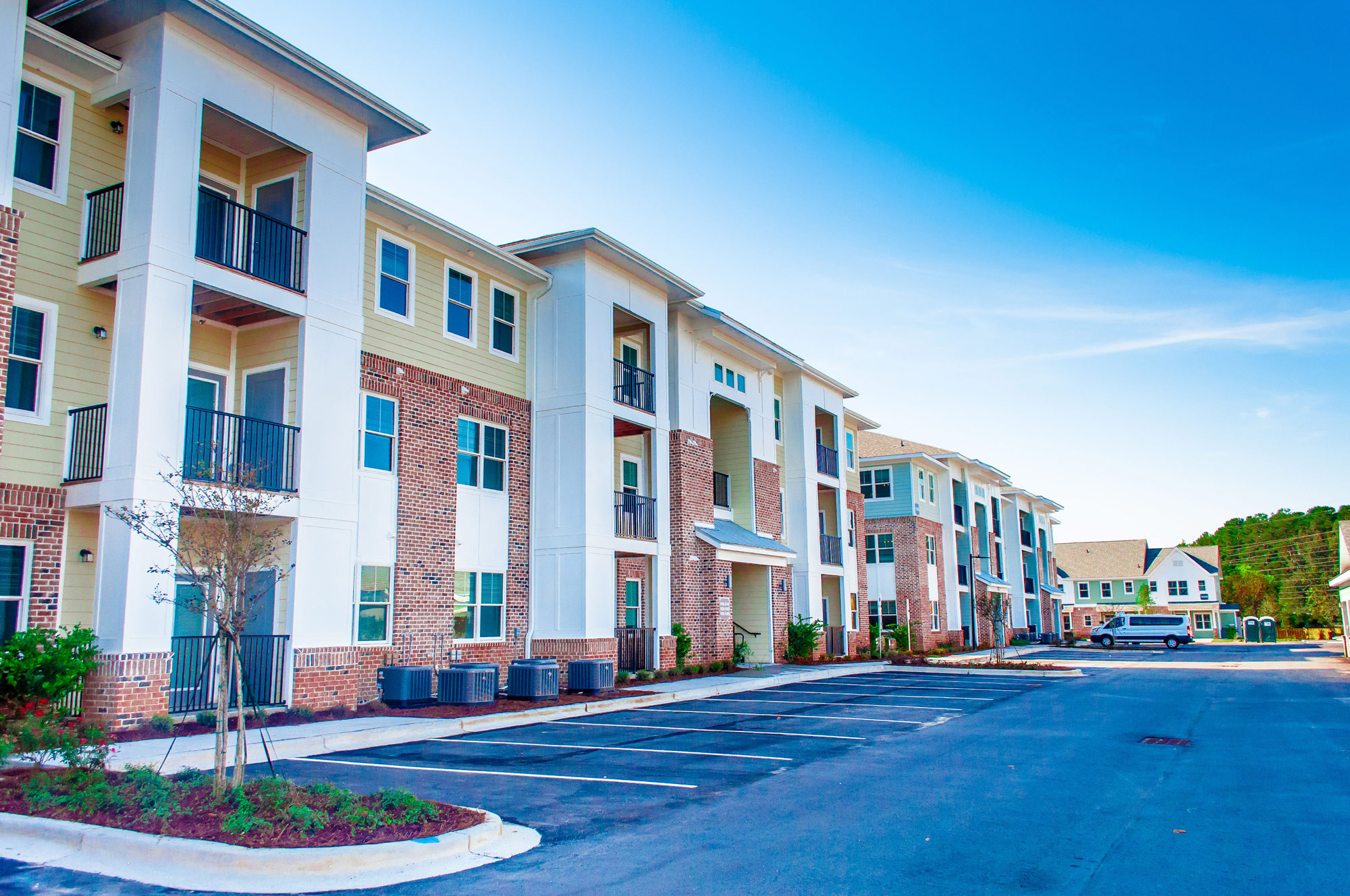 parking lot view of a property building