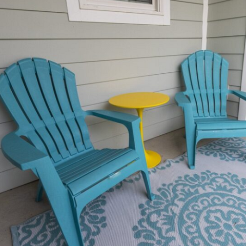 adirondack chairs on a patio
